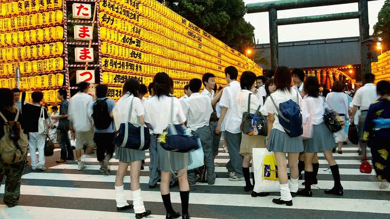 Fotografia em que podem ser vistos vários japoneses - Getty Images