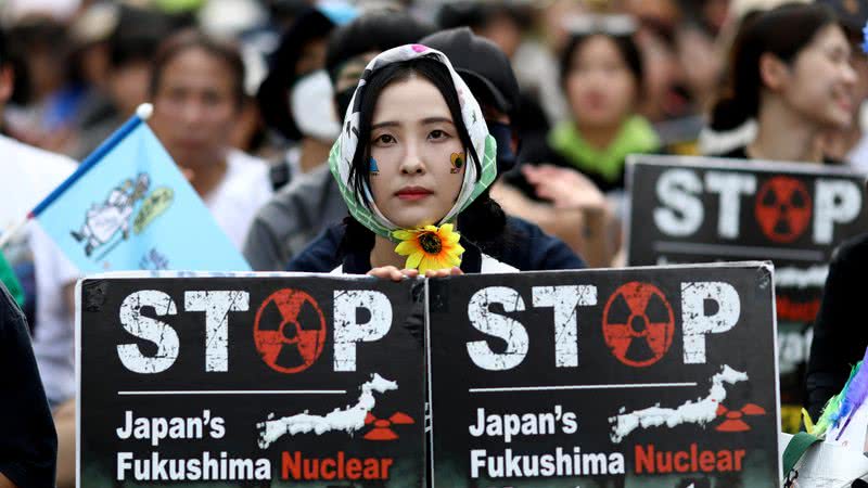 Manifestante sul-coreana em protesto sobre mudanças climáticas - Getty Images