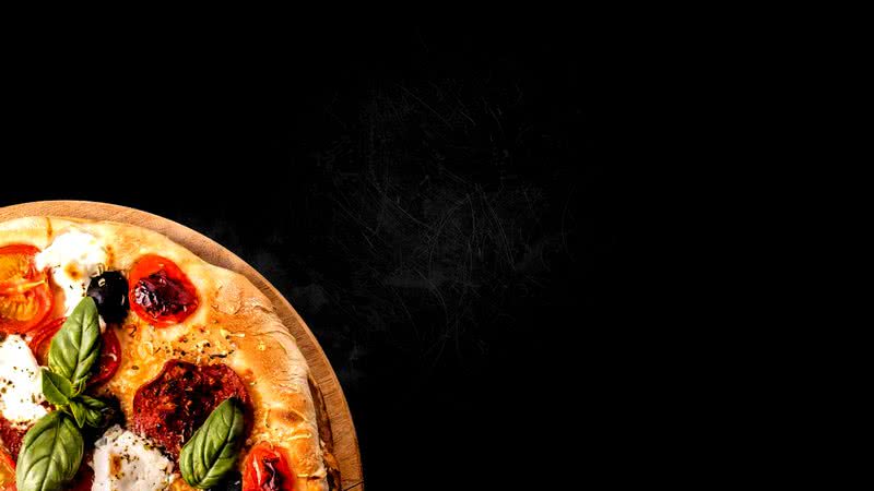 Imagem meramente ilustrativa de um pedaço de pizza - Pixabay