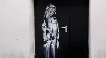 A obra de Bansky na saída de emergência do Bataclan - Divulgação/Pinterest