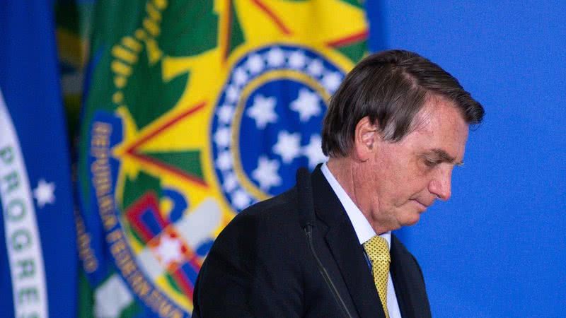 Bolsonaro cabisbaixo durante pronunciamento em 29 de junho - Getty Images