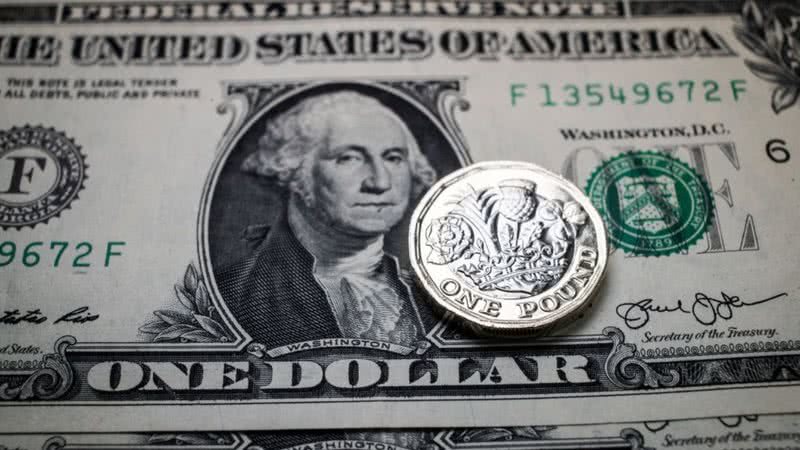 Cédula de 1 dólar sob libra esterlina - Getty Images