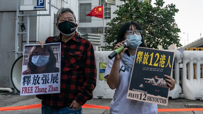 Ativistas protestando pela liberdade de Zhang Zhan em 2020 - Getty Images