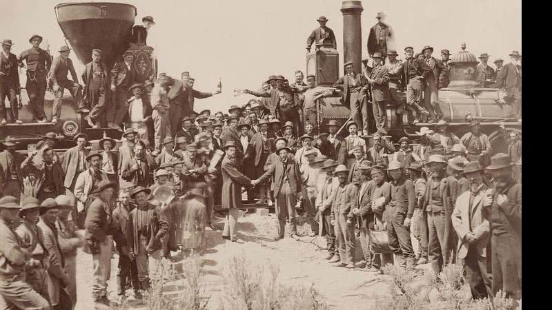 East and West Shaking Hands at LAying Last Rail  - Andrew Russell 