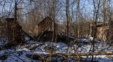 Seção abandonada do vilarejo que ficava em volta de Chernobyl - Getty Images