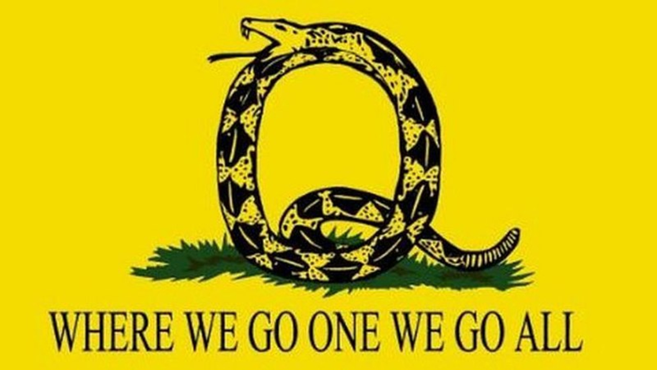 Bandeira do QAnon com os dizeres "where we go one we go all", ou "para onde vamos, vamos todos"