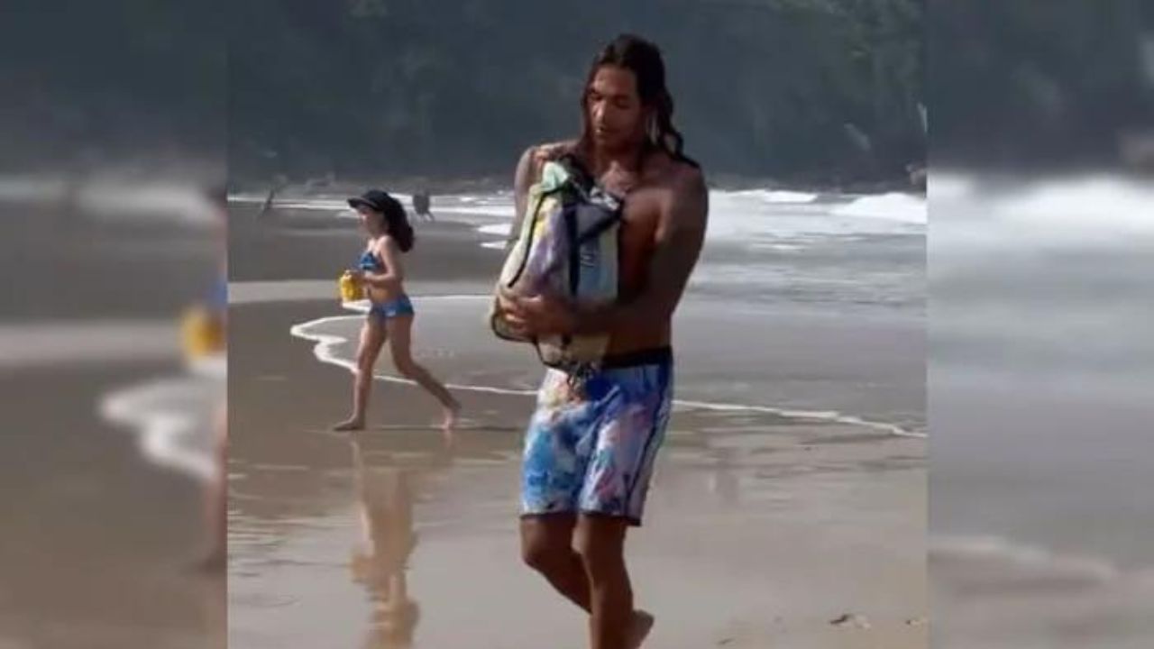 Surfista salva pinguim ferido em praia no litoral de São Paulo