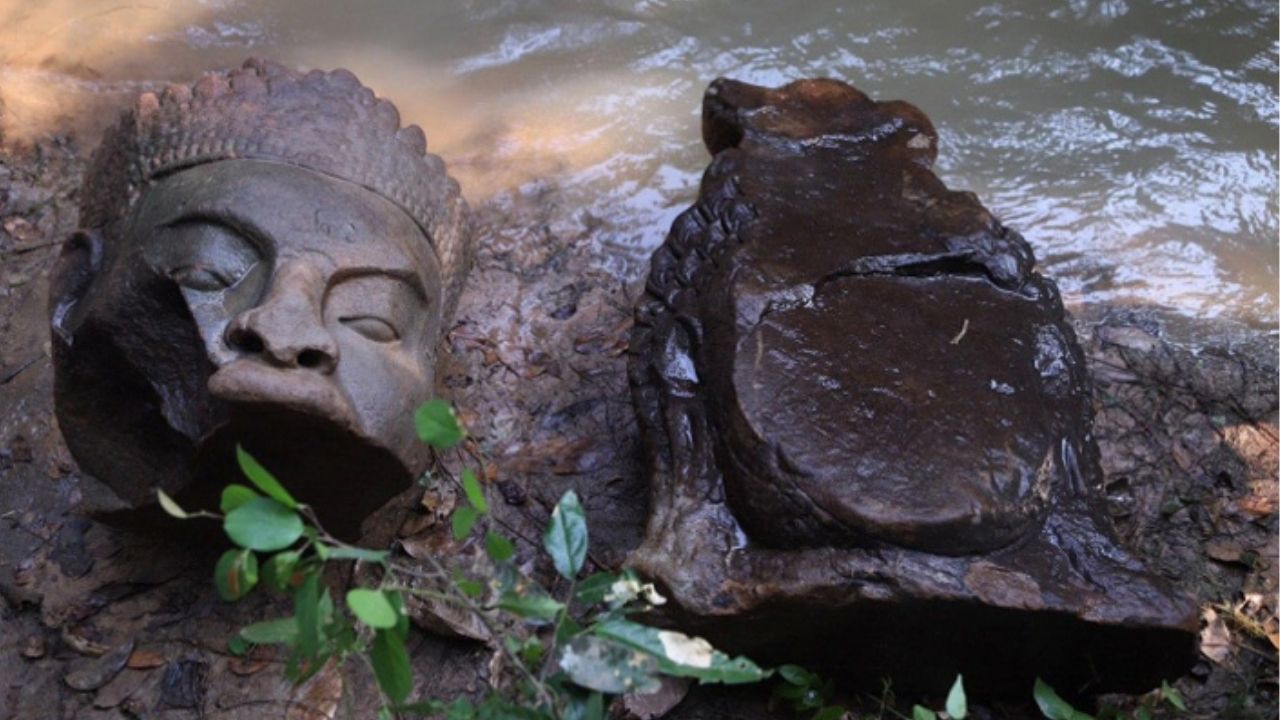 Gigantes cabeças de estátuas hindus são encontradas no Portão dos Mortos do Camboja