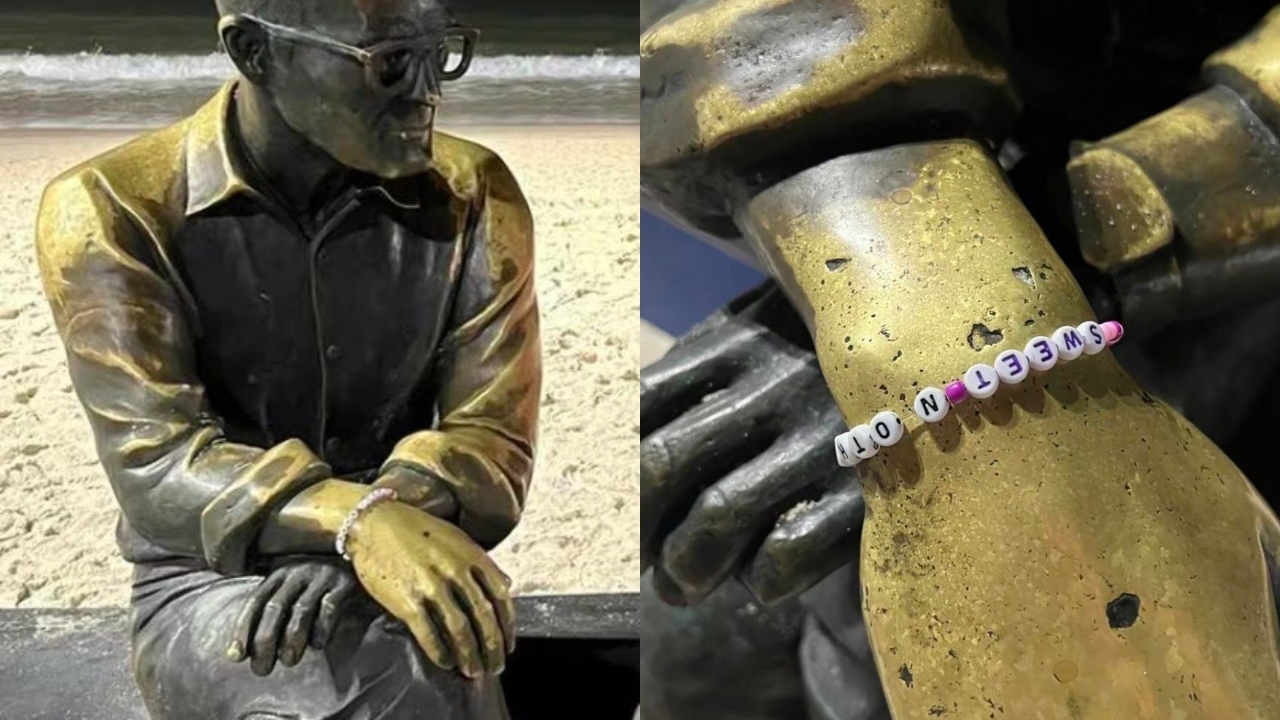 Por que a estátua de Carlos Drummond de Andrade recebeu uma pulseira?